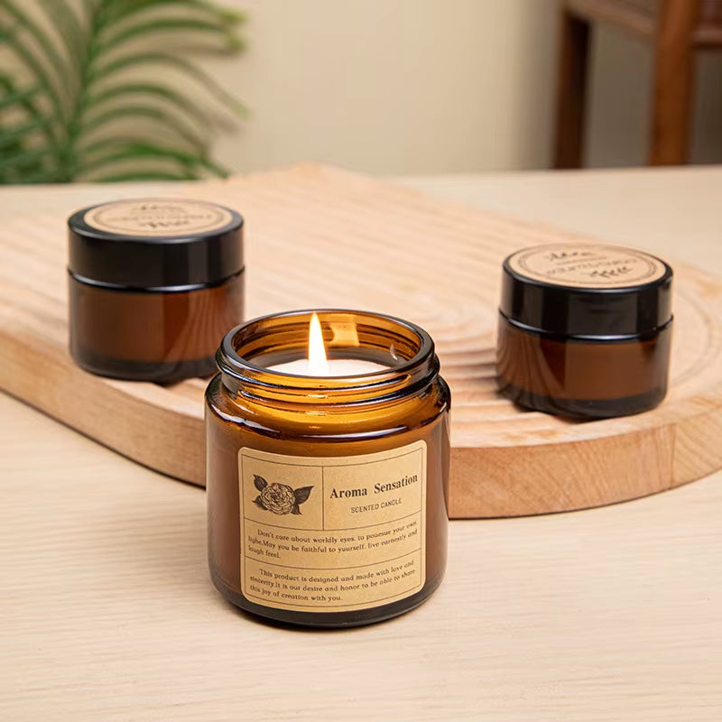 Aroma Sensation Hand-Poured Warm Vanilla Sandalwood Fragrance Cozy Ambiance Scented Candle Amber Glass Jar Relaxation Lit Flame