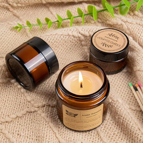 Aroma Sensation Hand-Poured Warm Vanilla Sandalwood Fragrance Cozy Ambiance Scented Candle Amber Glass Jar Relaxation Lit Flame