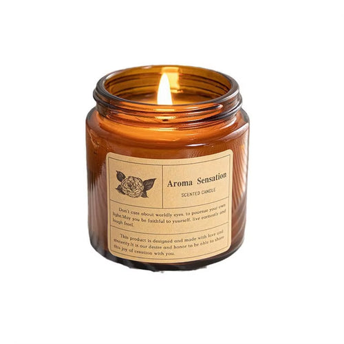 Aroma Sensation Hand-Poured Warm Vanilla Sandalwood Fragrance Cozy Ambiance Scented Candle Amber Glass Jar Relaxation Lit Flame